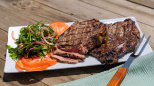 Marinated & Grilled Bone-In Strip Steaks